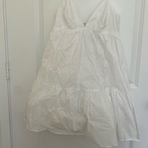 Beautiful short white dress. Medium. New